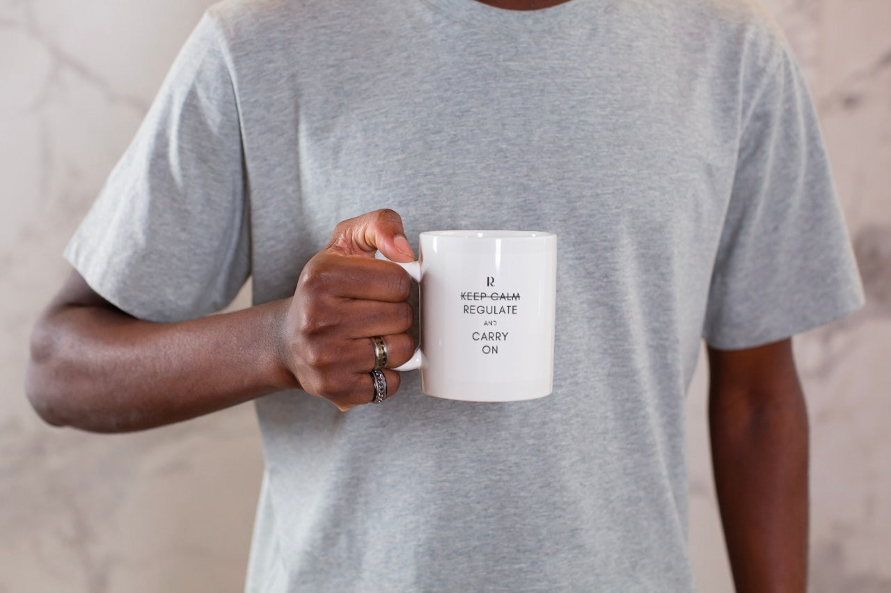 "Regulate and Carry On" Mug